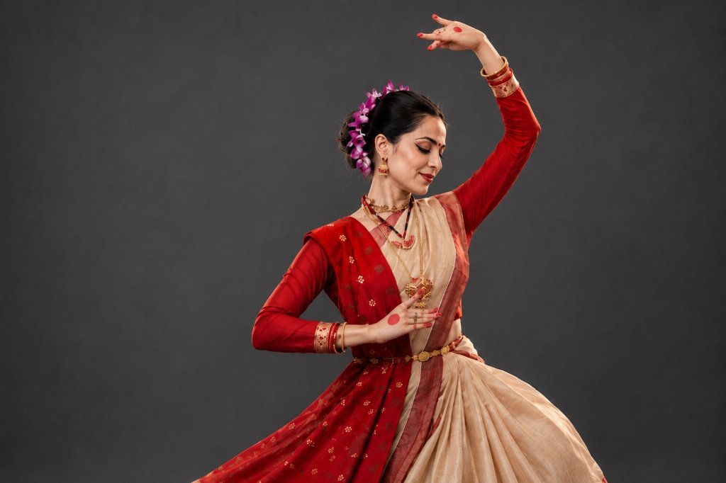 Kathak Recital Cream & Red Pose